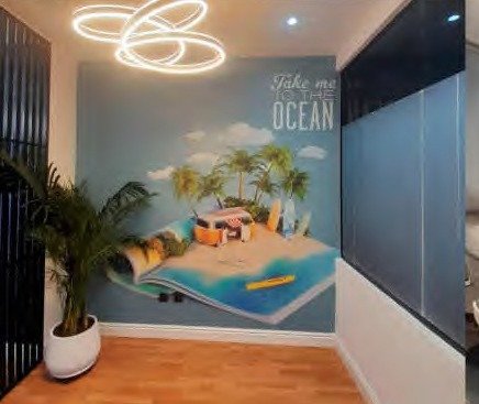 Ocean-themed breakout corner with custom mural
